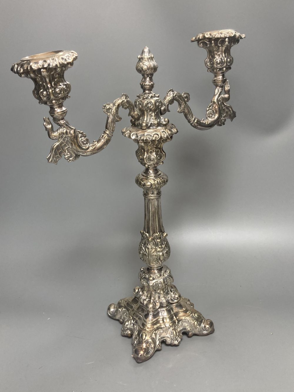 A silver plated twin light candelabrum, rococo style, hollow construction, 41cm high